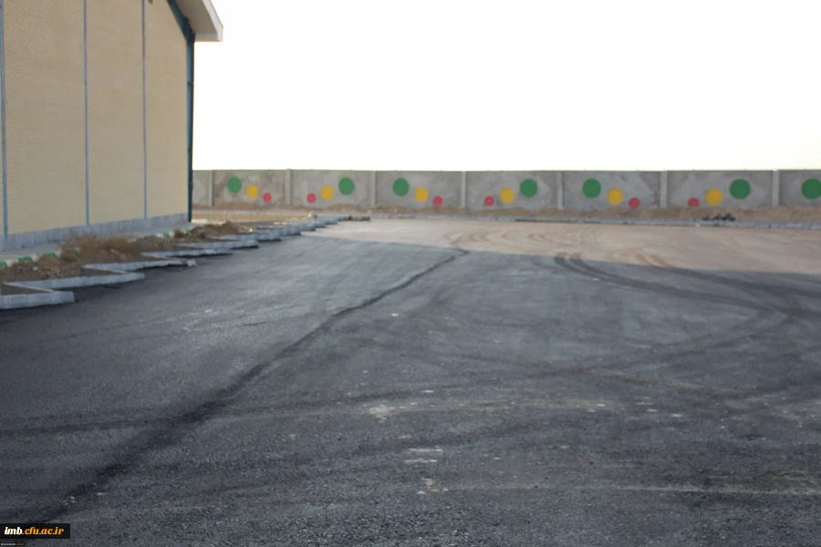 آسفالت ریزی محوطه سراهای دانشجویی و مجموعه ورزشی دانشگاه فرهنگیان خراسان شمالی 5