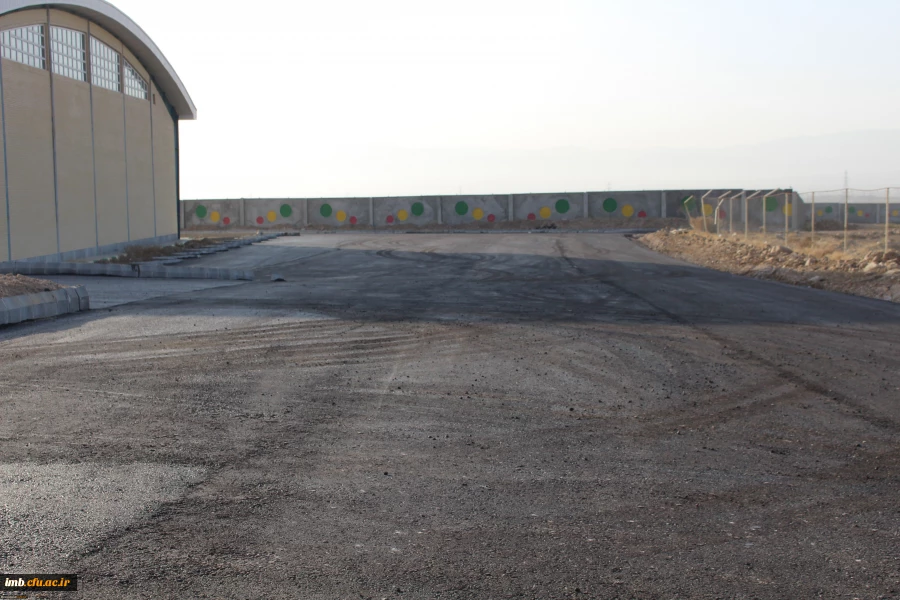 آسفالت ریزی محوطه سراهای دانشجویی و مجموعه ورزشی دانشگاه فرهنگیان خراسان شمالی 2